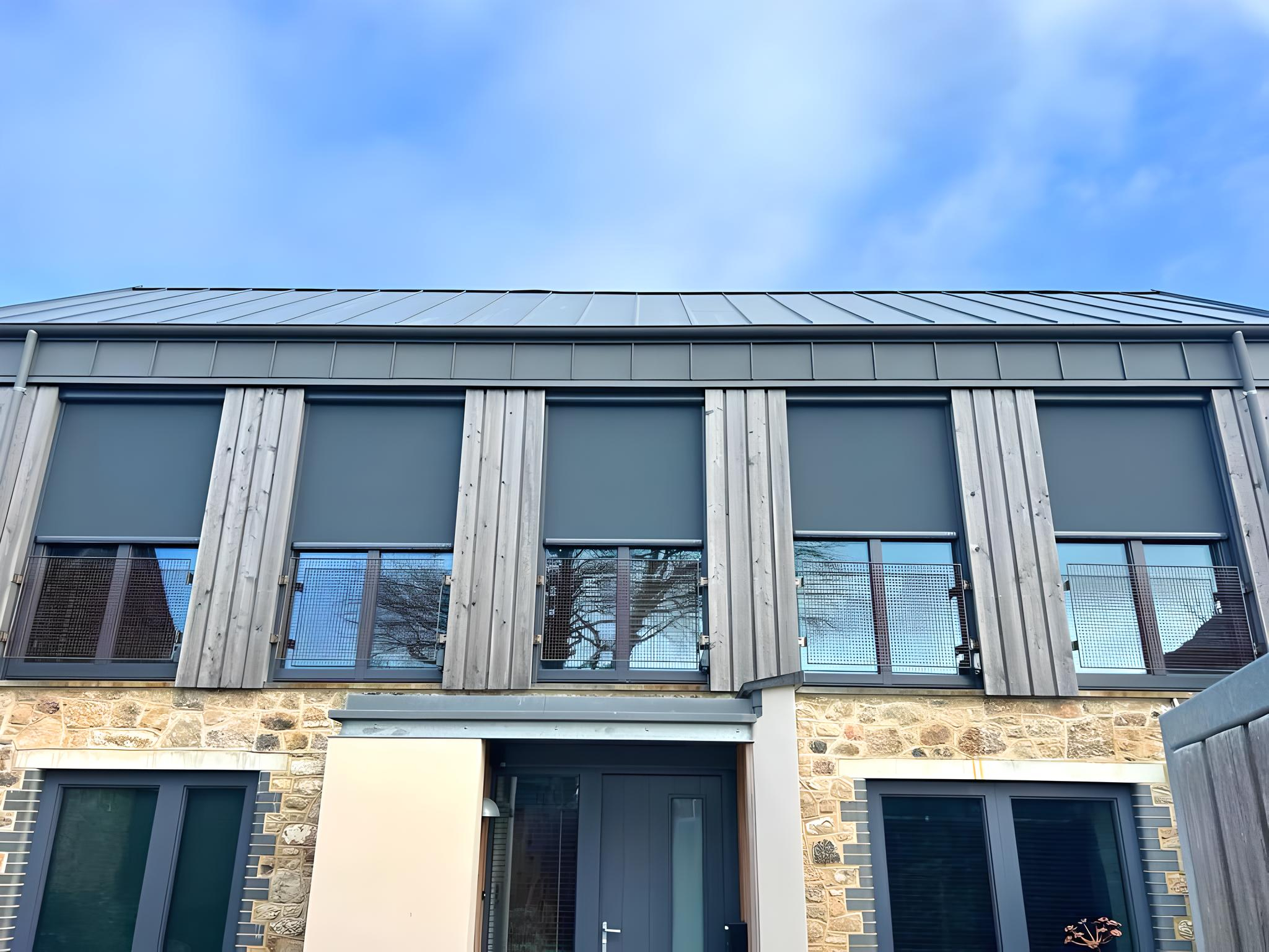 External zip screens installed at residential property in Devon for thermal and visual comfort.